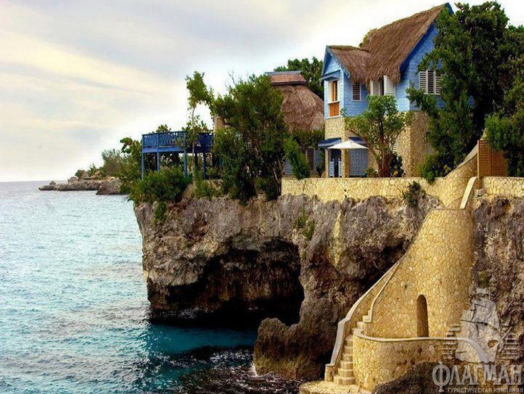 Negril-Jamaica. Домики на берегу океана.