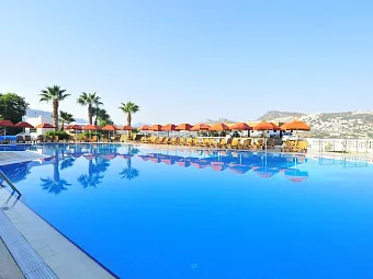 Отель GREEN BEACH RESORT 5*